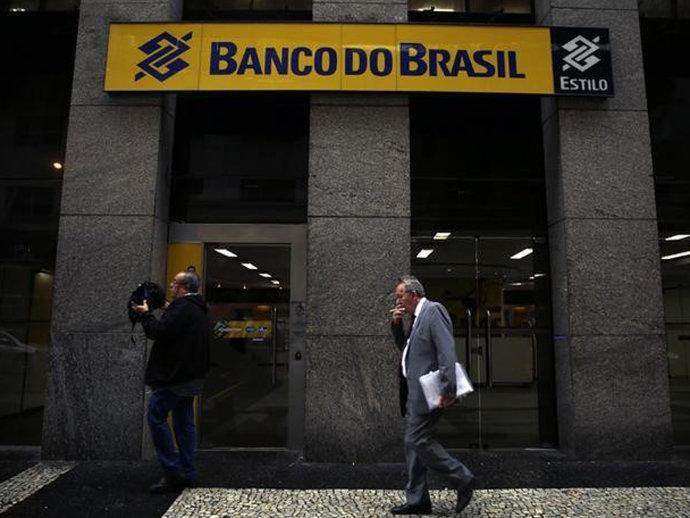 Dilma sanciona com vetos lei que autoriza BB e Caixa a comprarem participação em empresas