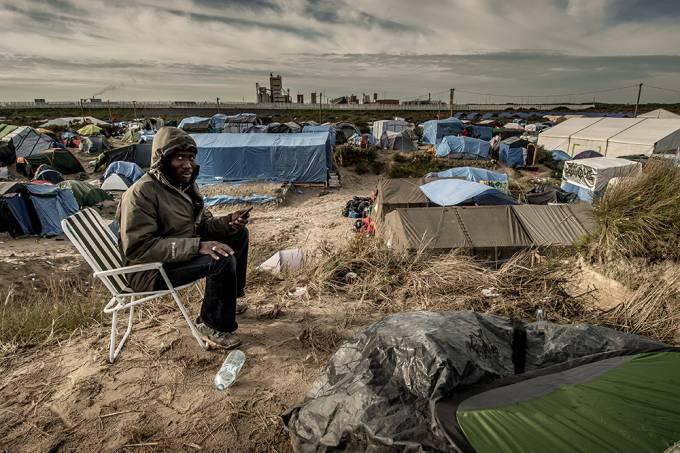 Hollande confirma: vai fechar acampamento de imigrantes em Calais