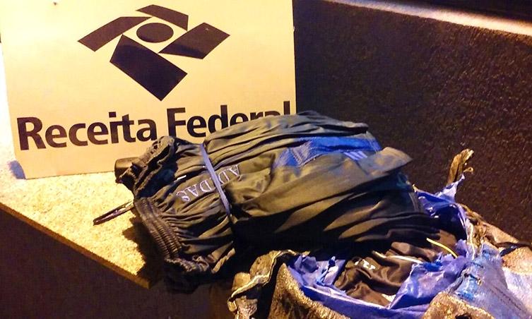 Homem é preso com mais de 1/2t de roupas falsificadas