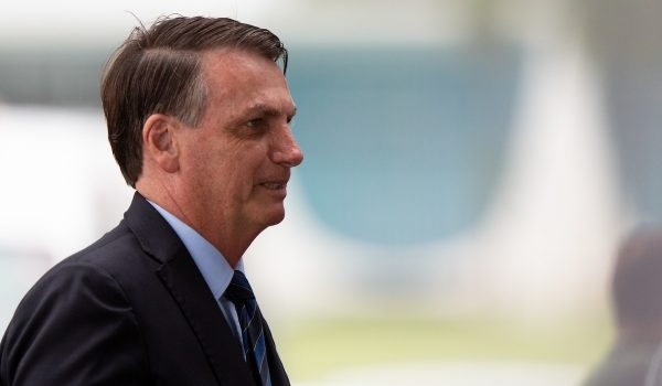 'Faltou visão' a quem construiu, diz Bolsonaro depois de sobrevoar SP após chuvas