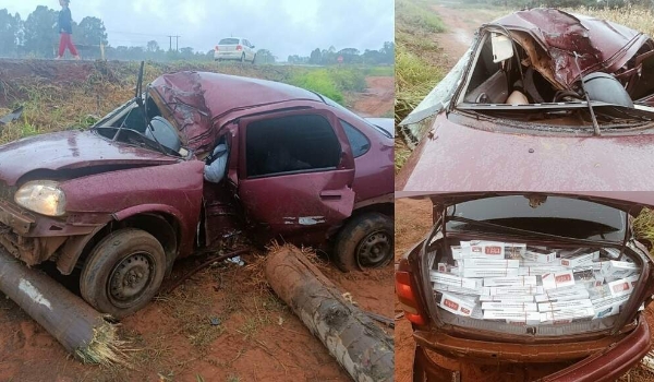 Dupla fica ferida após bater carro carregado com cigarros