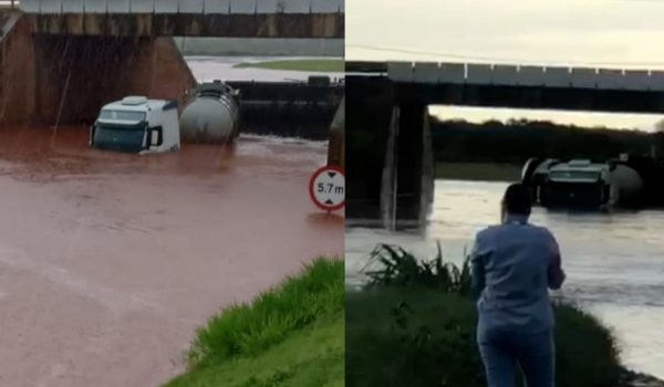 Carreta bitrem fica quase submersa sob viaduto na BR-163
