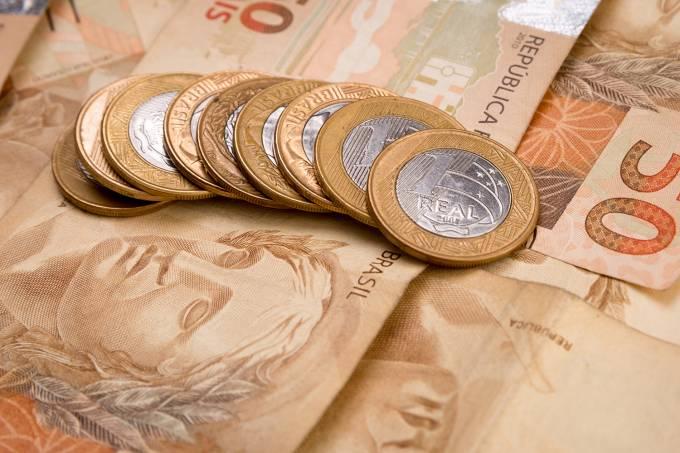 Economistas baixam a previsão para o PIB